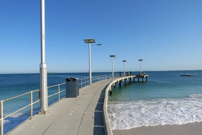 The jetty at Jurien Bay reaching into calm turquoise water on the Turquoise Coast